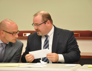 David A. Weinstein, Counsel for Sussex County, reviews the deposits received by the bidders.