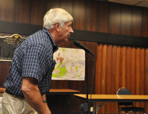 George Aubrecht addresses the council.