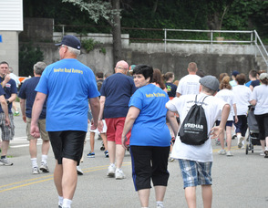 Members of the Town of Newton team, the Newton Road Runners, including Municipal Clerk Lorraine Read, looking over her shoulder.
