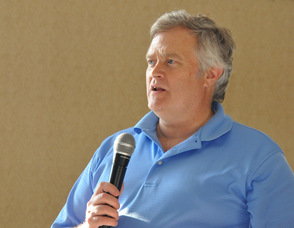 George Graham, Secretary/Treasurer of the Sussex County League of Municipalities, moderating the program.