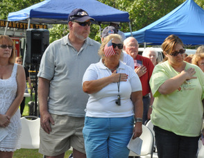 Members of the audience during the National Anthem.
