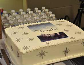 Cake with the "Trinity" book cover emblazoned on it, for the book launch celebration.