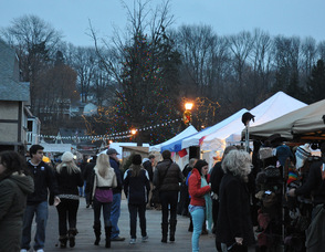 Attendees at the Lake Mohawk German Christmas Market mingle on the Boardwalk.