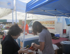 Christian Worley of Dr. Pickle and customer Estelle Edelson