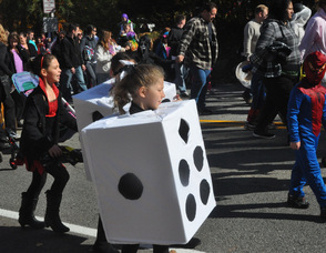 A pair of dice walk down Riverstyx Road.
