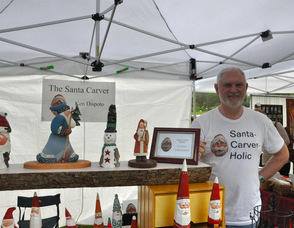 Ken Dispoto, the Santa Carver, was one of the vendors at the open house.