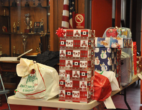Loads of gifts in the firehouse for the second trip.
