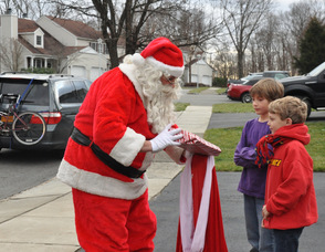 Santa visits Damon and Ronan Postance, ages 10, and 7.