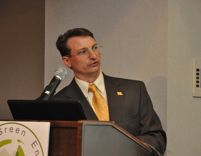 Samuel K. Burlum speaking during the World Green Energy Symposium.
