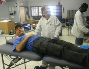 Senior Manager of the Red Cross in Philadelphia Nancy Blackledge with donor Carl Scialfa