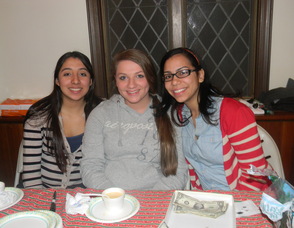 Youth Director Oshaira Pichardo with two of its members