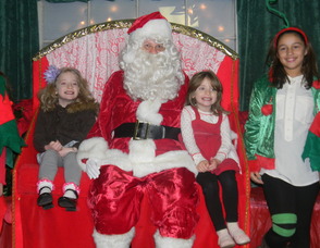 Julie and Emily Piazza with Santa