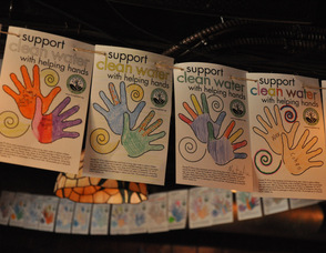 Hands created by local students from Helen Morgan and Alpine Schools, strung around the restaurant's ceiling.