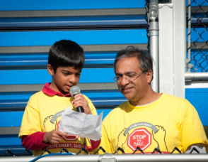 Anay reads the Pledge with Dad Sunil