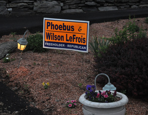 A sign posted outside of the Farmstead Golf & Country Club, where Gail Phoebus and Helen Le Frois supporters convened.