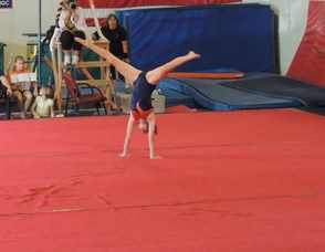 Christina Chernati Straddles on Floor.