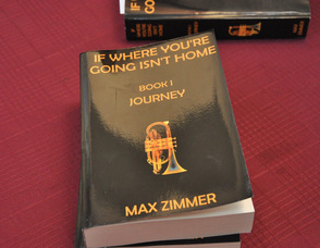 Copies of Max Zimmer's books, ready to be autographed.