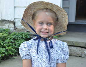 Baylie Touw, age 4, member of Children of the American Revolution (CAR) in period-style costume.