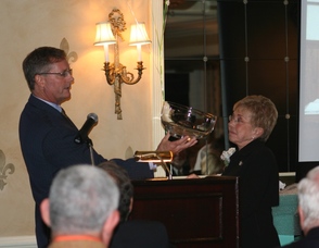 Charles Weidman presenting Linda Maggio with a gift on behalf of the WUF