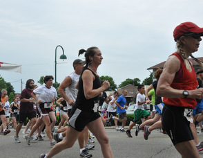Runners set the pace along lower Spring Street.