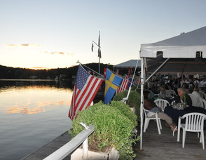 The sun sets a pinkish tone over the Lake Mohawk Country Club, and "Grapes By The Lake."