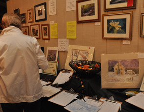 Attendees browse through the silent auction items.