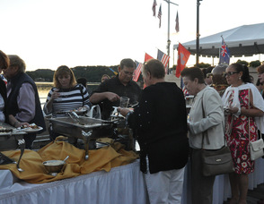 Guest help themselves to food on the Boardwalk.