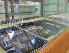 A fondant owl overlooks the last few baked goods late Saturday afternoon.