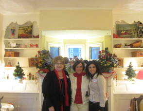 Patti Larkins, the social events chair, Anne Lawless, president of the club and Deanna Peterson, the hostess