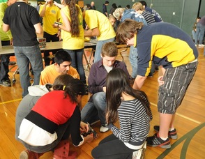 Members of the Madison High School Physics Team meet before the race.