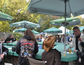 Attendees relax outside of the Village Saloon.