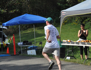 Tom Sweeney at the finish.