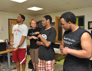 Gus Gauntlet, Hip Hop Playwright, works with students at the Teen Center in Morristown.