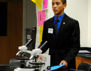West Orange High School student council president, Matthew Brown, leads a tour through one of the science classrooms and gives a brief description of the many science classes available at WOHS.