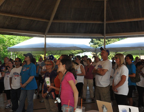 Participants listen to words of encouragement at the opening ceremonies.