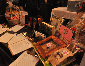 Items at the silent auction including picture frames, and gift baskets.