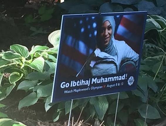 5f9eeeffbcdfd33daf8b_muhammad_lawn_sign_a.jpg