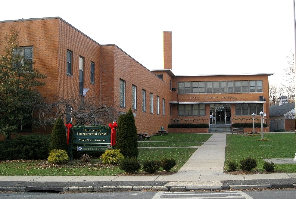 9b62fea9ff108cc7f354_Holy_Trinity_outside_of_school.jpg