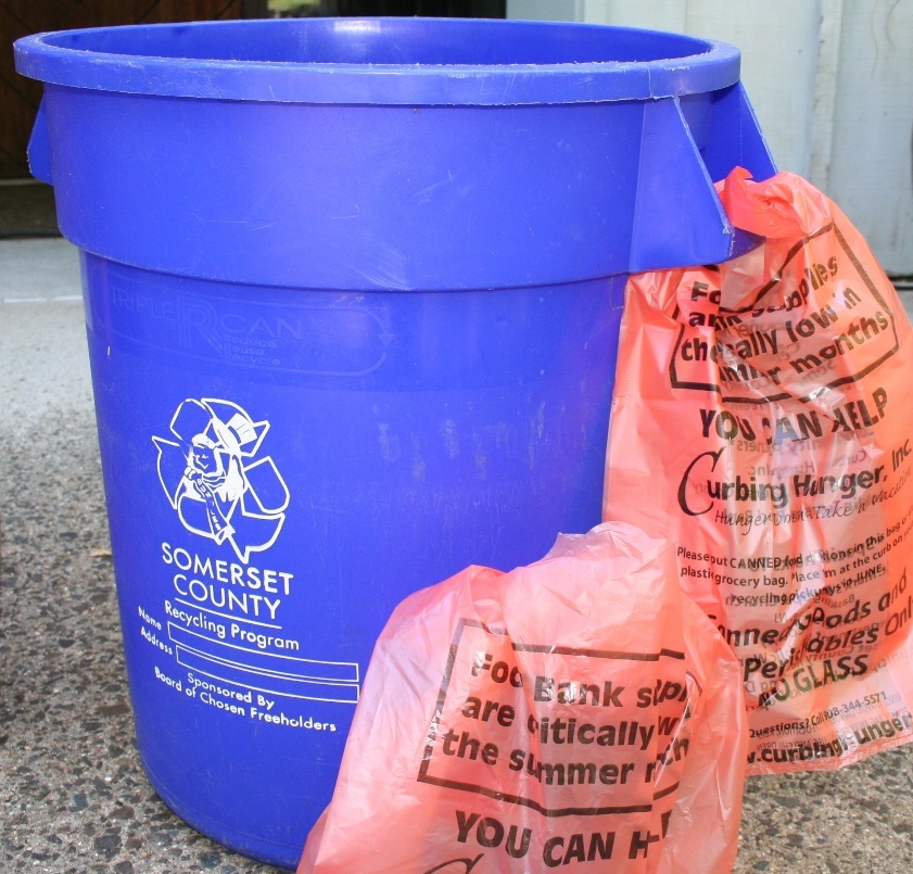 518d793c1df37006cd18__CH_Orange_Bags_on_Blue_Bucket_2014_-cropped.jpg
