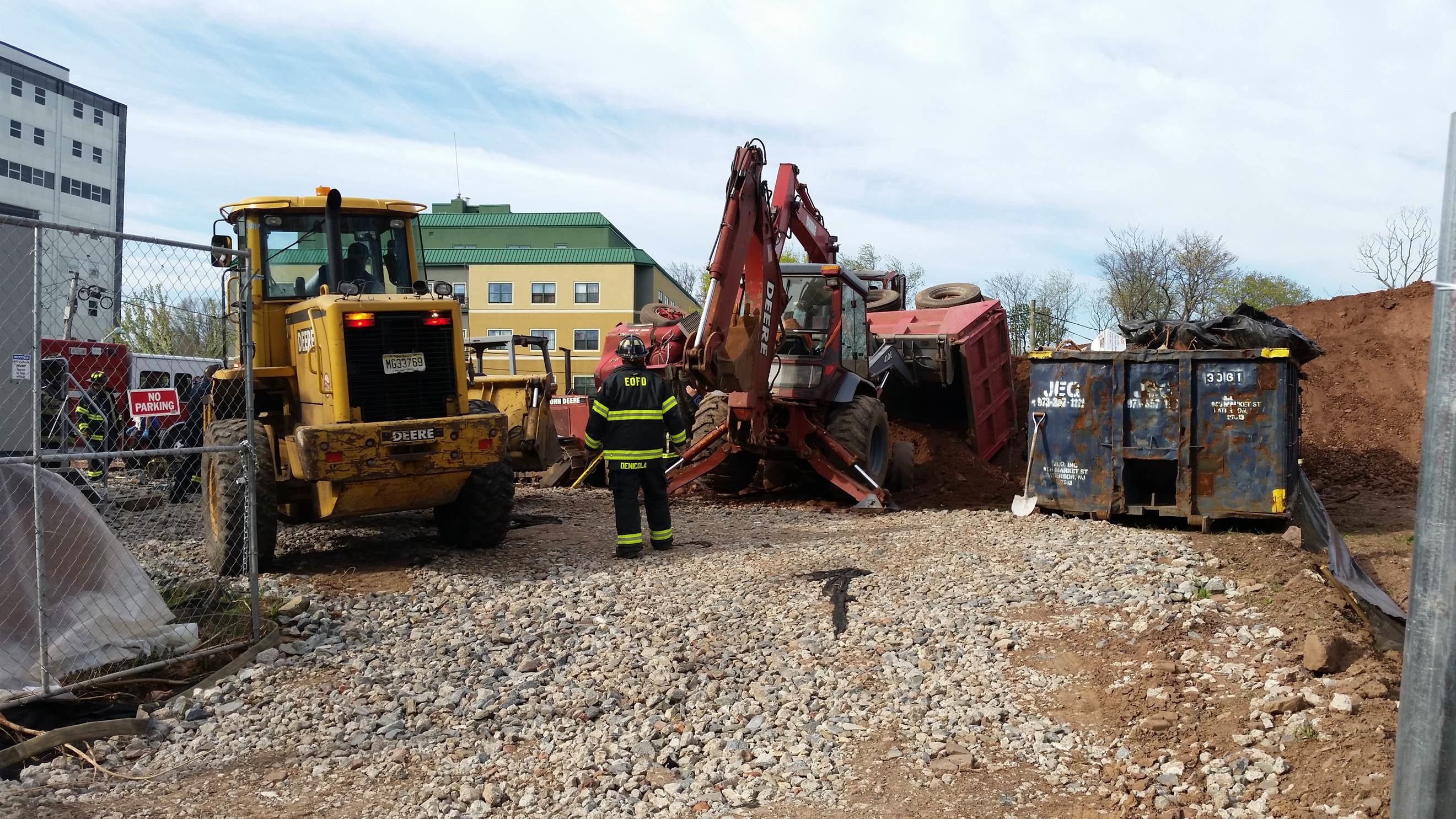 east orange construction worker trapped under dump truck rescued by east orange public works
