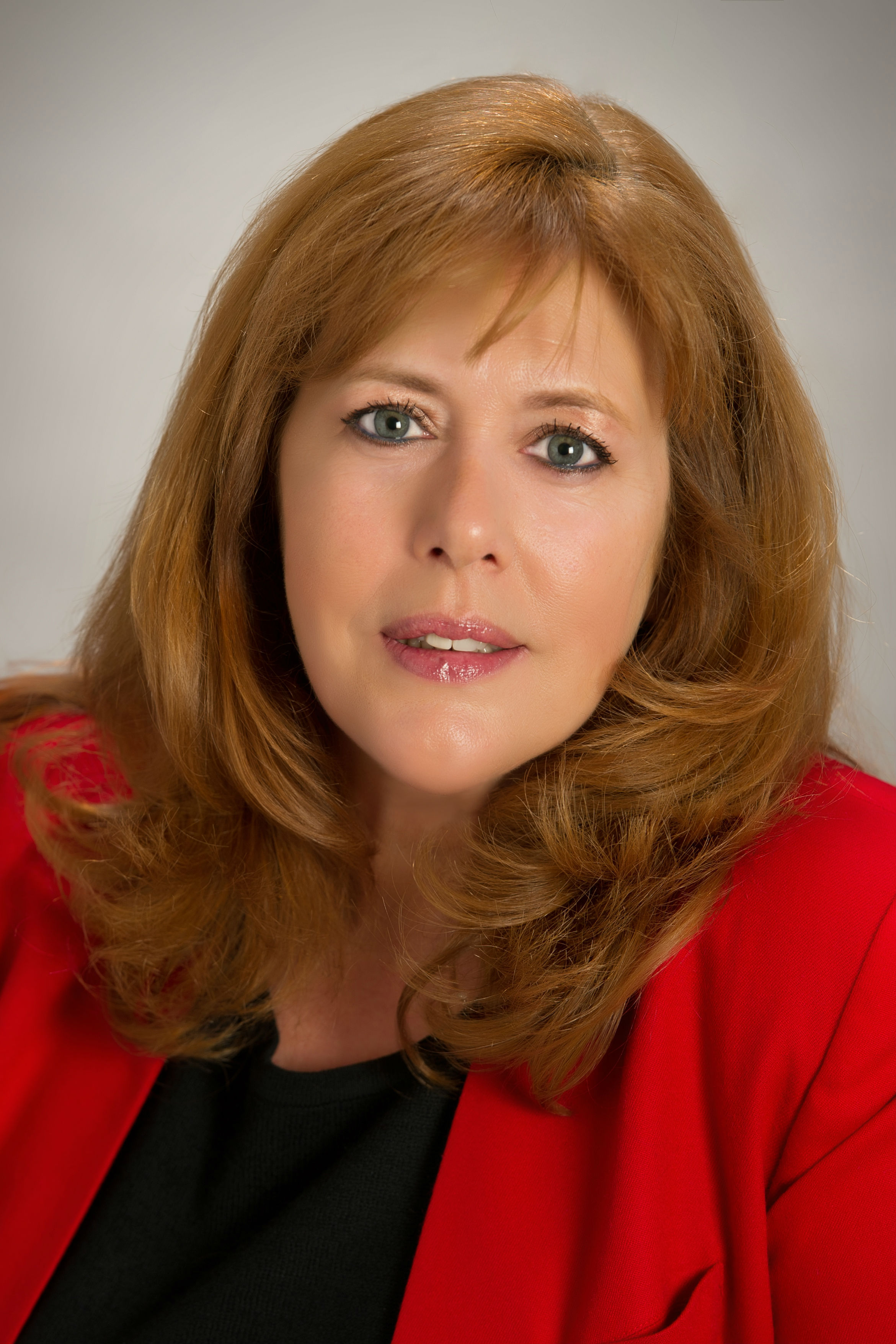831b7a29260b36ec30cc_boe_-_laura_headshot_color_redo.jpg
