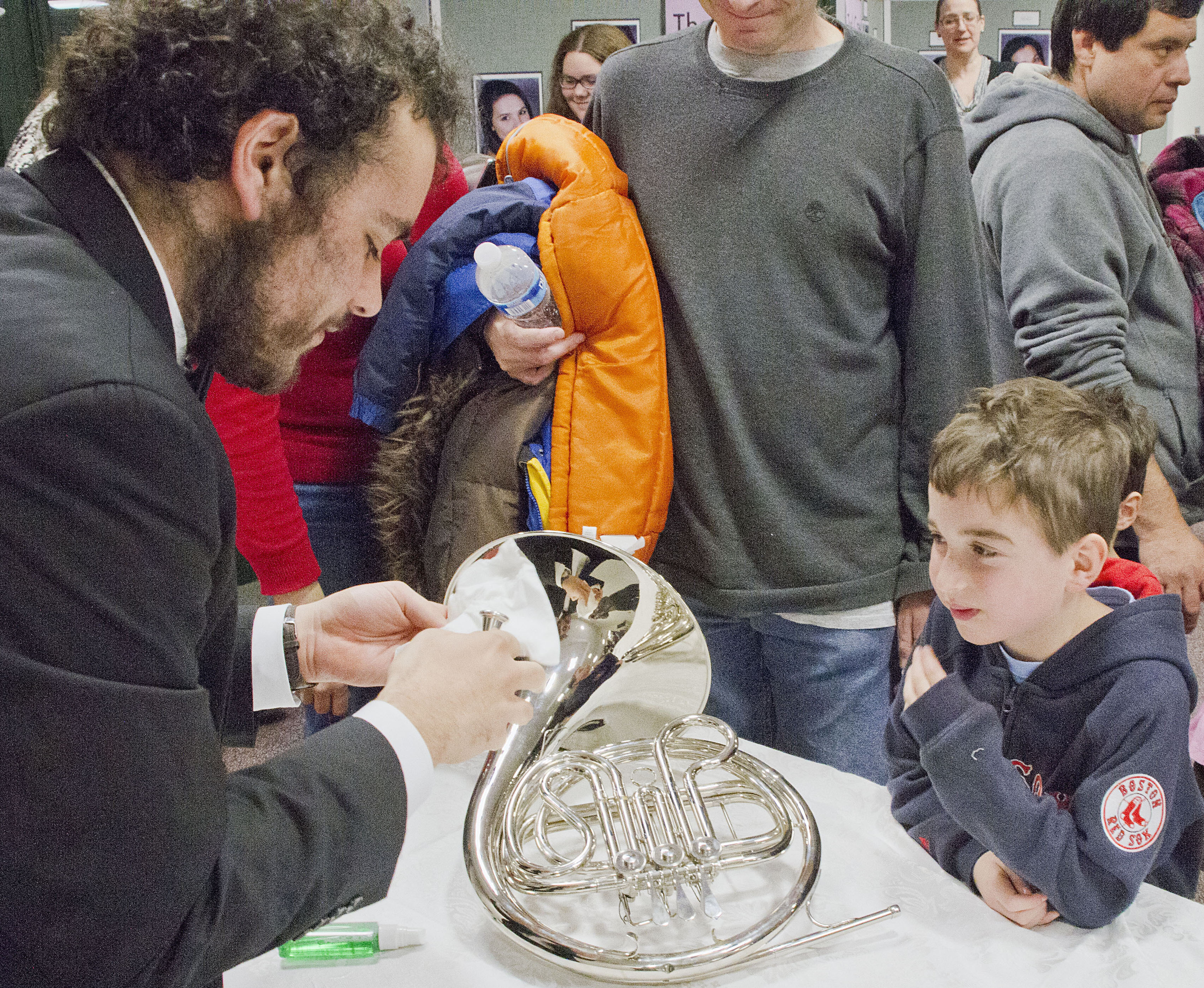 1d3666d3b11de5ea8ba0_Learning_to_play_the_French_Horn_at_NJIO_s_Instrument_Petting_Zoo.jpg