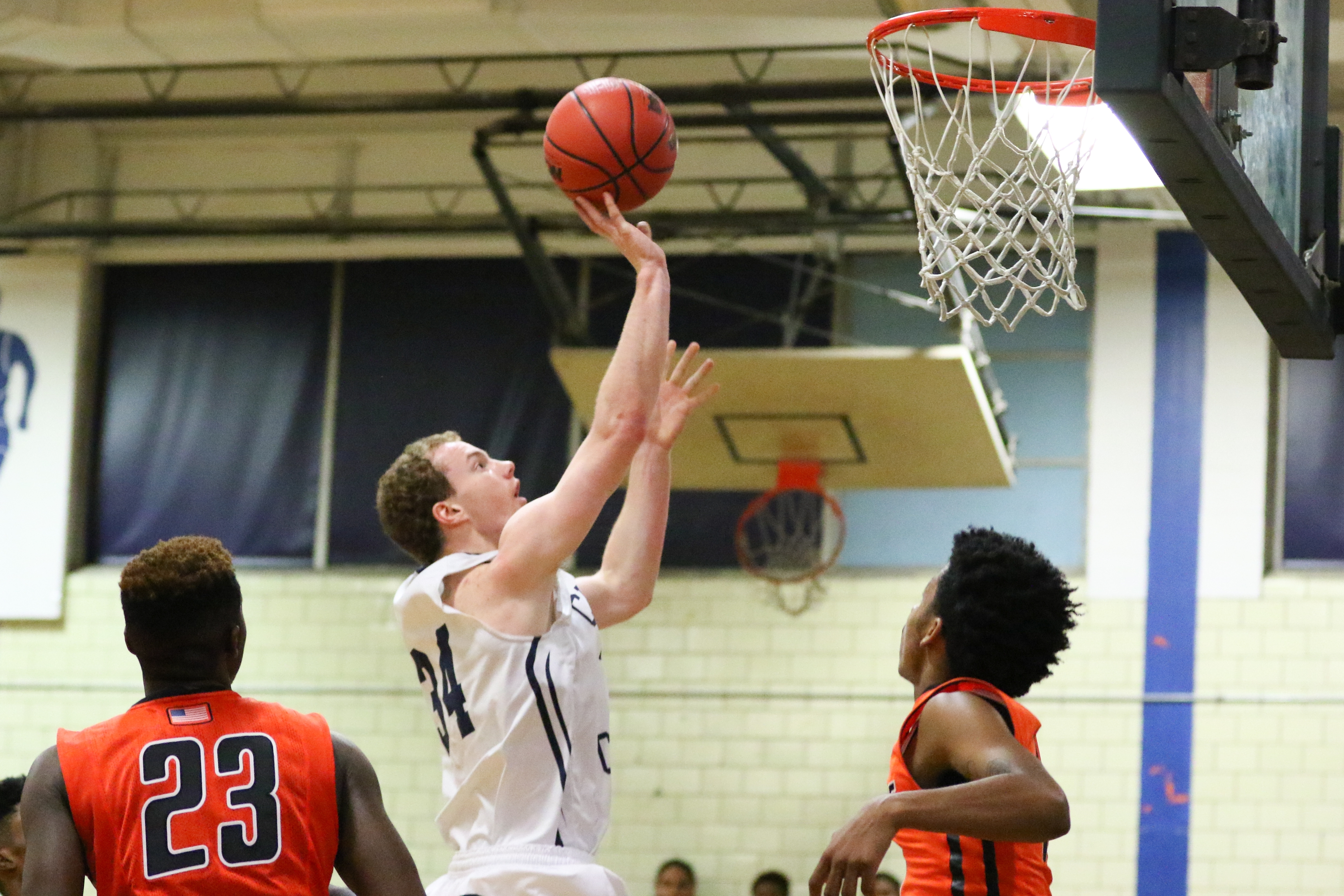 fb7a40eedb76b5a3ea8c_0ac93827944a3441dfad_Boys_B-ball_vs._Orange-3.jpg