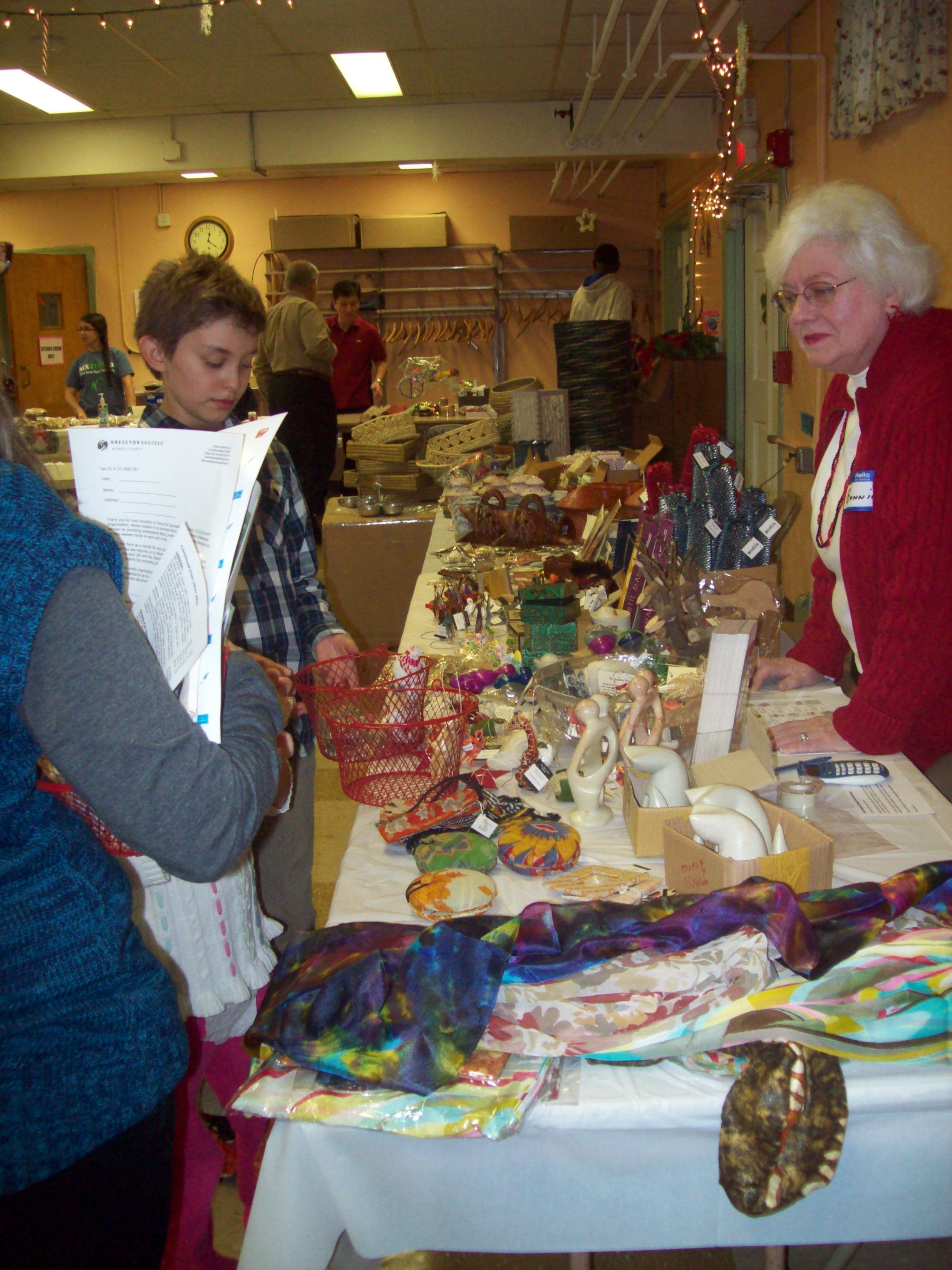 926949a519124626fe9a_10241605cbb1879221e2_Bonnie_at_10K_Villages_table.jpg
