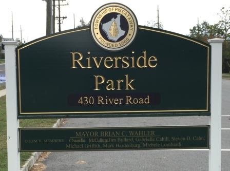 31c760fcb18ac6983830_Riverside_Park_Sign.jpg