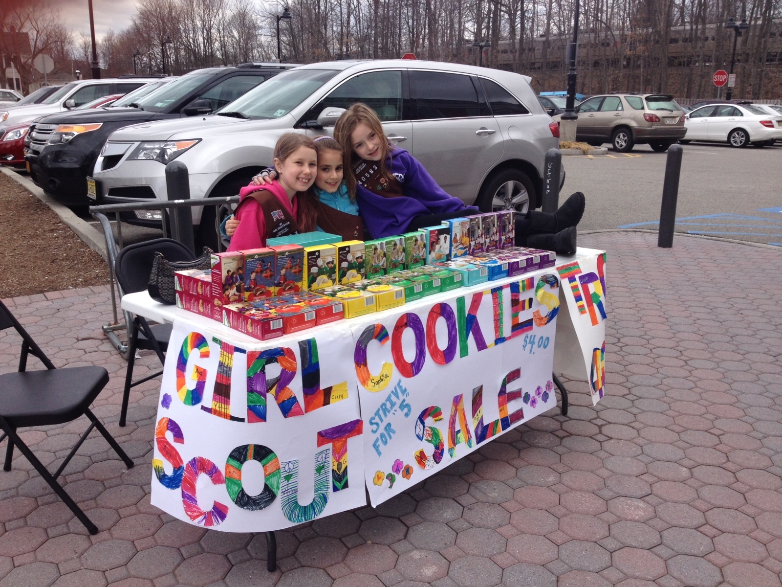 a2a25e909044aa0be844_Troop_40583_2014_Cookie_Sale_Booth.jpg