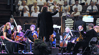 b1265b2e1a7096c9a33b_Tramm_Conducting_SHU.jpg