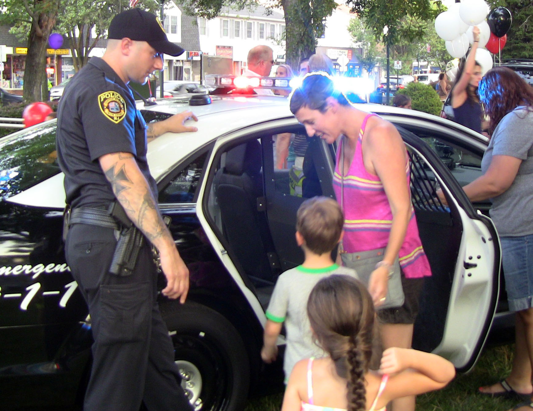 23826671a24d03d0e0b1_Climbing_Inside_SPPD_car.jpg