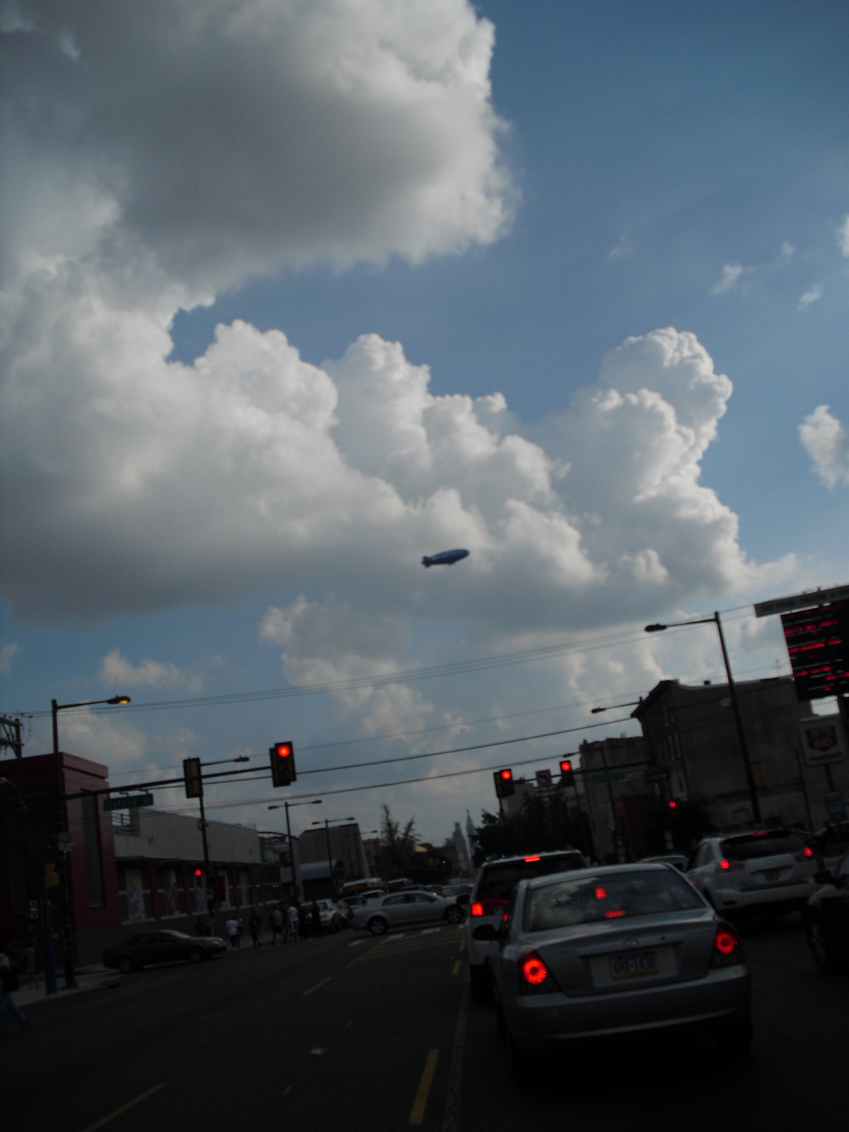 40b6f149f19e012619b5_Phil-2-blimp___clouds.jpg