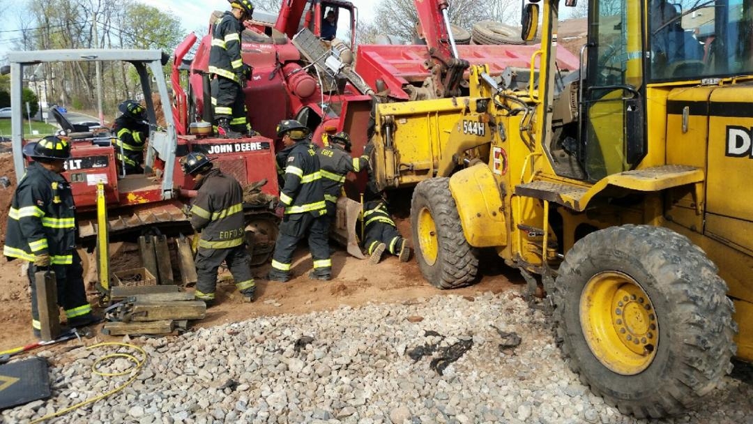 east orange construction worker trapped under dump truck rescued by east orange public works